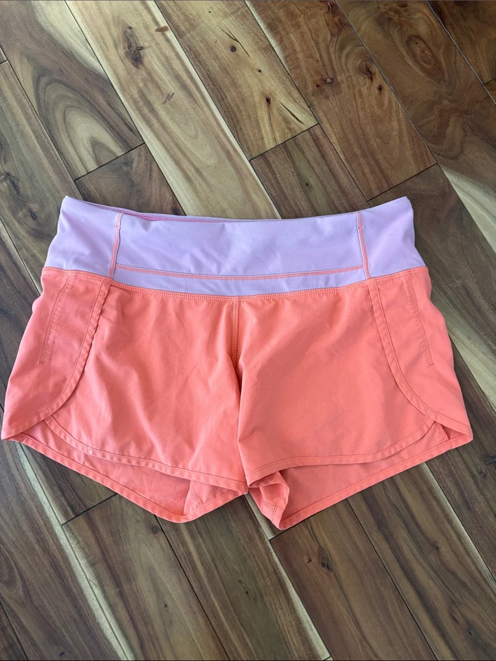 Discontinued lululemon athletica Coral Shorts with Light Pink Waistband